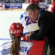 ST. CATHARINES, CANADA - JANUARY 8: Russia assistant coach Alexei Chistyakov has a conversation with Elena Vodopyanova #23 during warm up prior to preliminary round action against Canada at the 2016 IIHF Ice Hockey U18 Women's World Championship. (Photo by Jana Chytilova/HHOF-IIHF Images)

